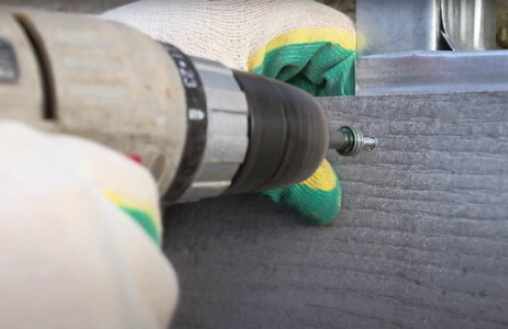 Крепление фиброцементного сайдинга саморезами